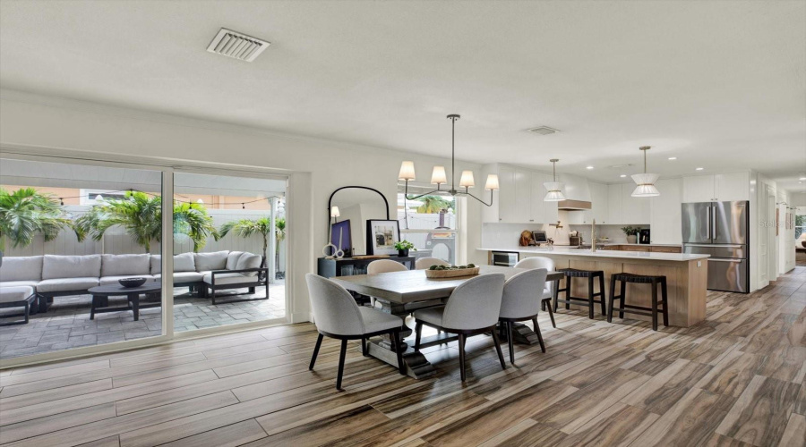 Dining/Kitchen/Glimpse To Patio