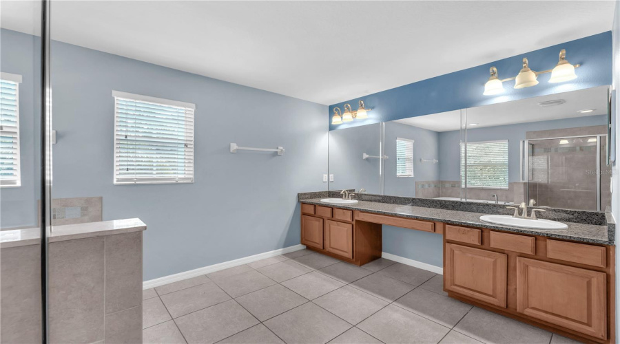 Granite Countertops, Dual Sinks On A Long Vanity And Private Water Closet.