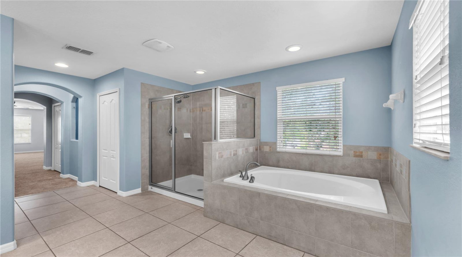 Buyers Will Love This Relaxing Garden Tub And Separate Walk-In Shower.