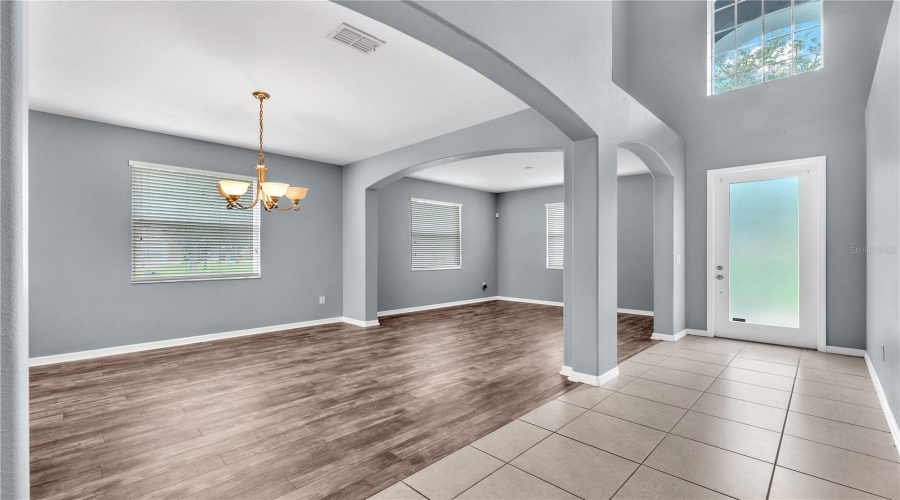 A Two-Story Foyer With A Soaring 19-Foot Ceiling And Leaded Glass Front Door Creates An Impressive First Impression.