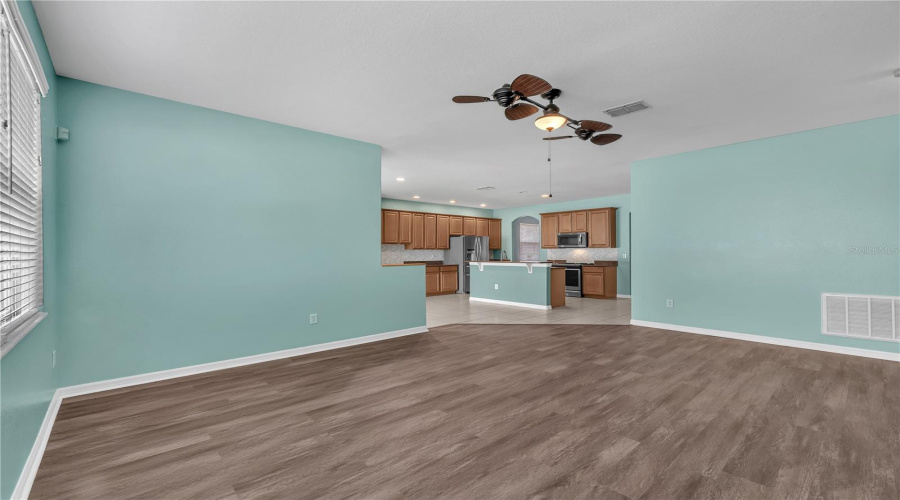 The Kitchen Opens Seamlessly To The Family Room And Covered Lanai, Making Everyday Living Connected And Effortless.