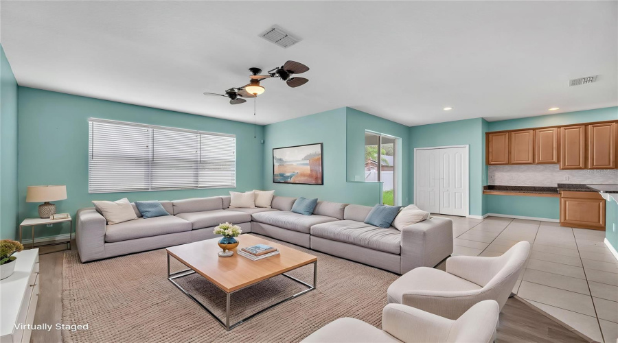 The Family Room Is Connected To A Sunny Breakfast Nook And Access To The Backyard.