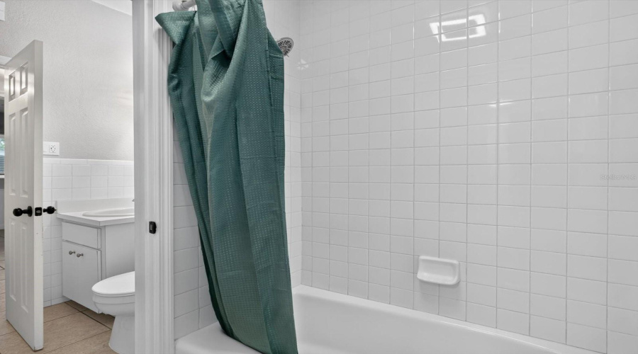 Shared Shower In Between Both 1/2 Baths.