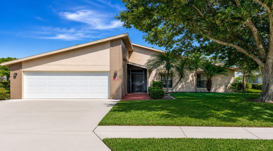 Front Exterior: Virtually Enhanced – Welcome To Park Forest! 411 Cypress Forest Dr. Offers Inviting Curb Appeal And A Warm Florida Welcome In This Desirable 55+ Community.