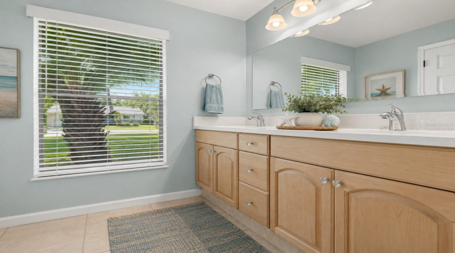 •  Primary Bath – Vanity: Virtually Staged – Primary Bath Enhanced With Soft Coastal Colors And Décor While Showcasing The Spacious Double Vanity.