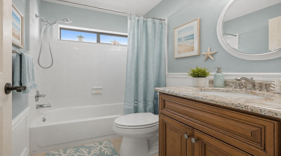 •  Guest Bedroom: Virtually Staged – Bright Guest Bedroom Styled With Light Coastal Furnishings And Soothing Coastal Accents.
