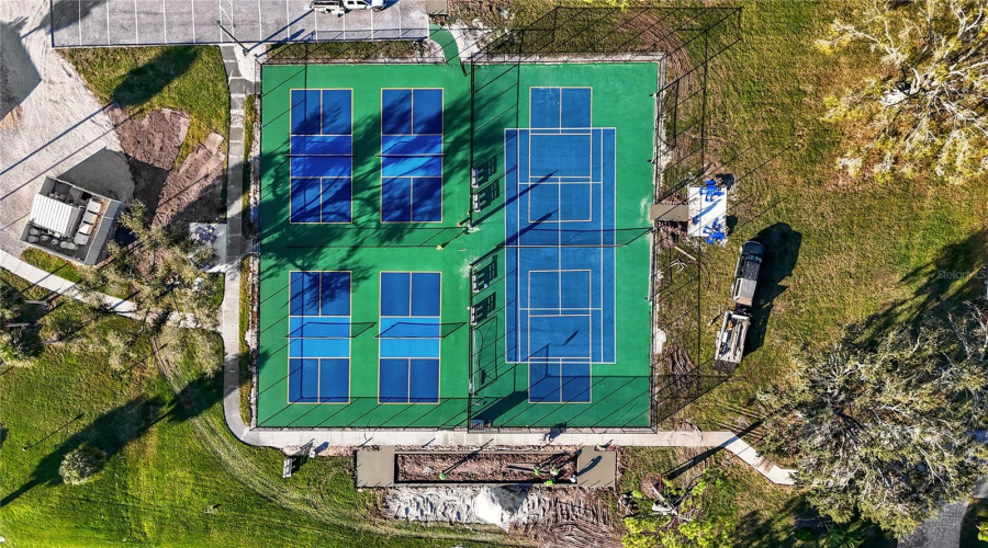 Aerial View Of Pickleball &Amp; Tennis Courts. The  Bocce Ball Court On The Right Has Recenlty Been Completed