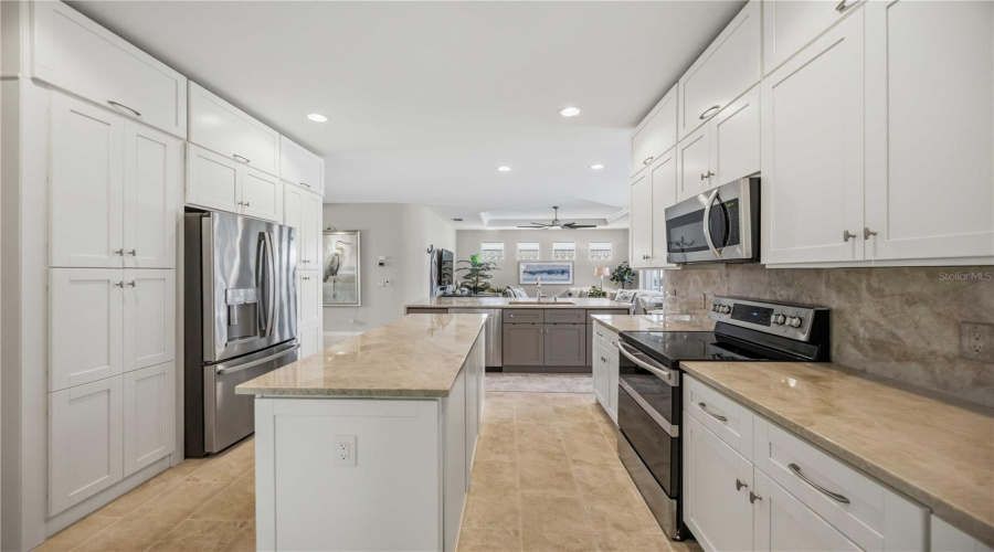 Pantry Next To Stainless Steel Refrigerator.