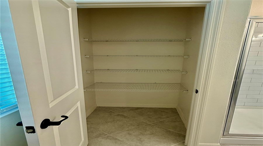Oversized Linen Closet In Primary Bath.