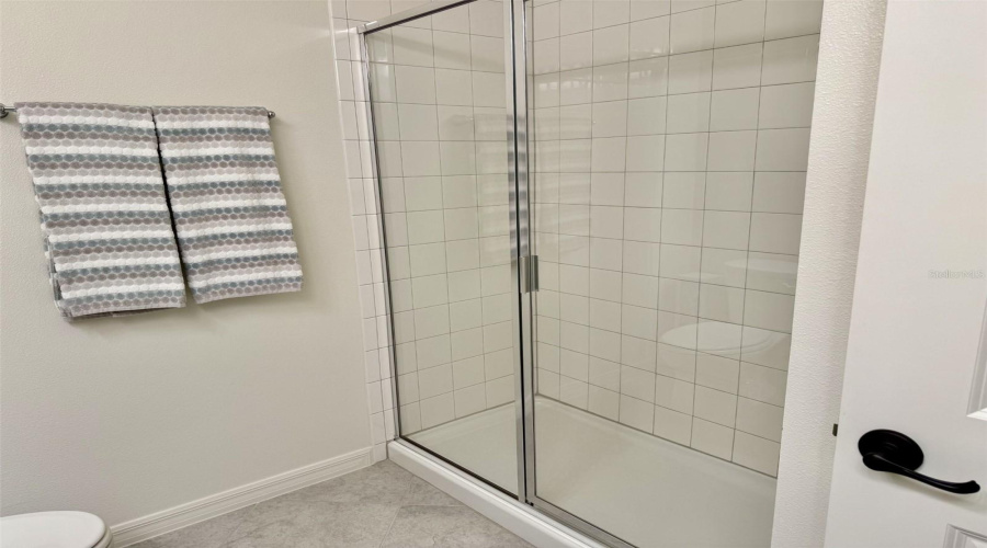Secondary Bathroom With Shower.