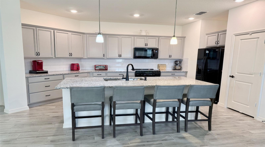 Gorgeous Kitchen With Large Center Island.