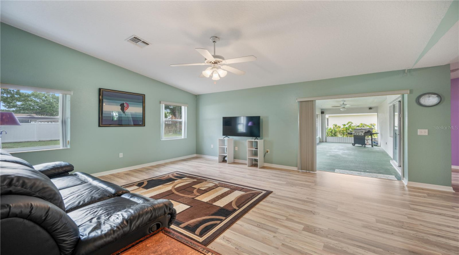 Large Family Room Opens Up To Lanai With Pocket Sliders