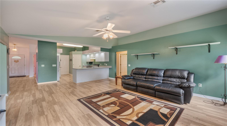 Large Family Room Opens Up To Lanai With Pocket Sliders