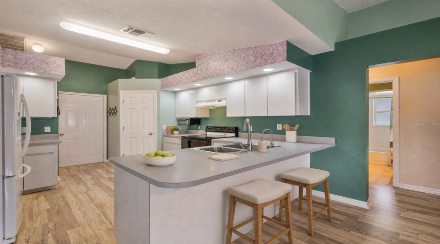 Kitchen / Bar Area - Virtually Staged To Enhance Experience.