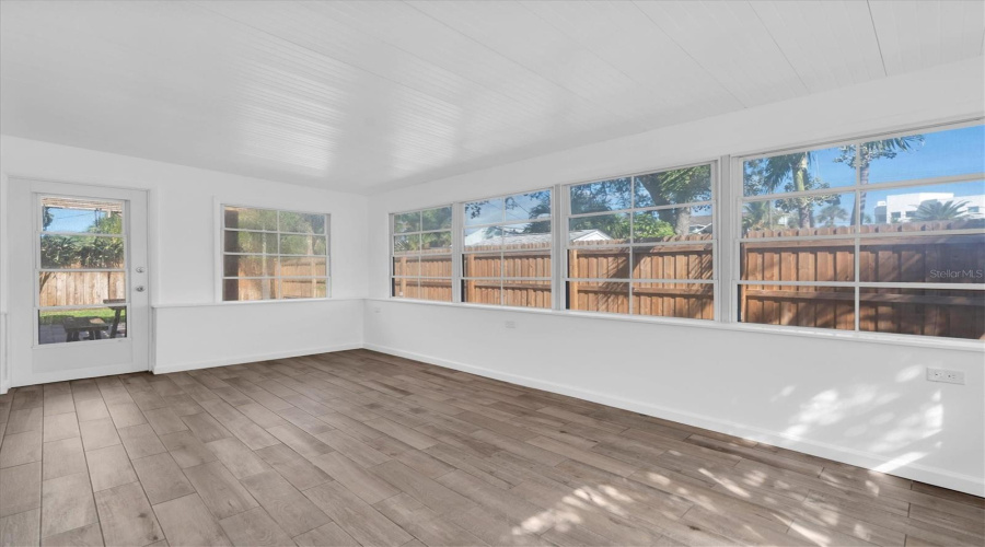 Enclosed Sunroom With Yard Access