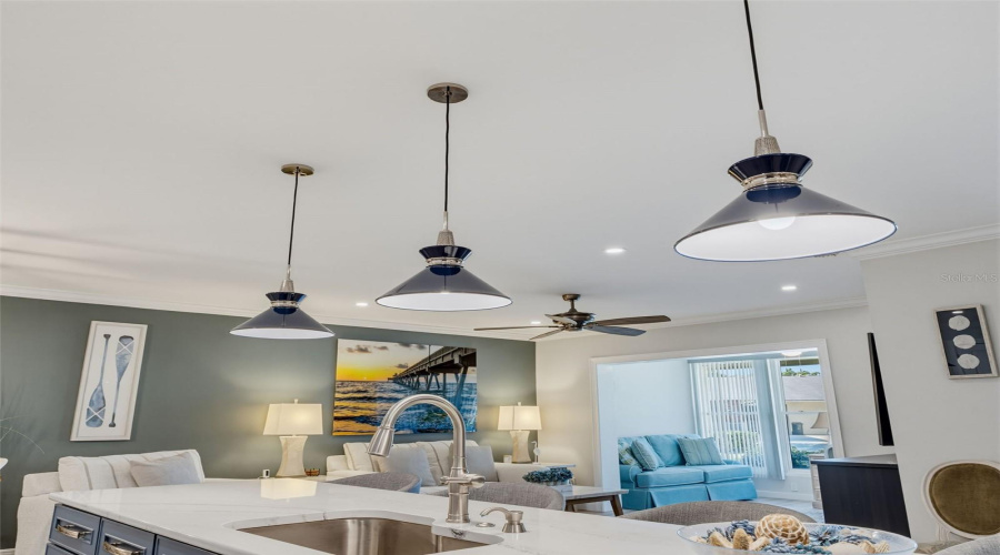 Accentuating Blue Pendant Island Lights
