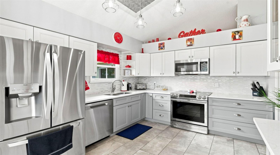 Fully Updated Kitchen-Featuring Quartz Counters And Two Tone Cabinets