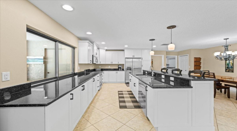 Granite Topped White Cabinetry