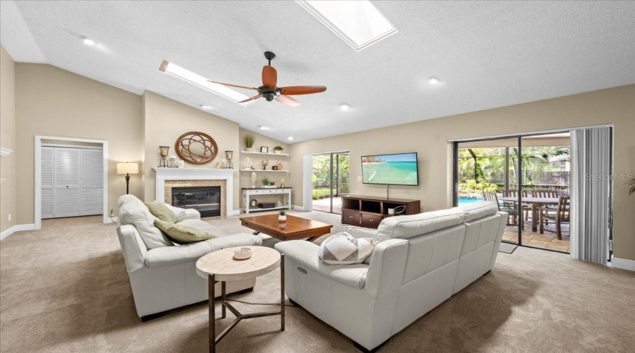 Inviting Family Room With Wood Fireplace