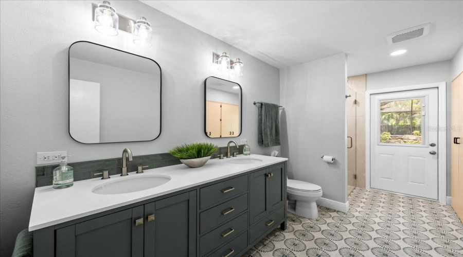 Guest Bathroom With Dual Sinks, Walk-In Shower And Storage. Door To Pool, Making This A Perfect &Quot;Pool Bath&Quot;.