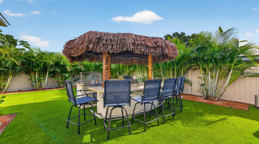 Fenced Yard With Artificial Turf
