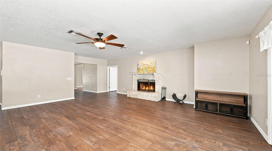 Family Room + Wood Burning Fireplace