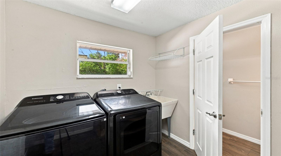 Downstairs Laundry With Half Bath For Pool Access