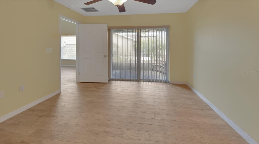 Primary With Sliding Door To Patio Lanai