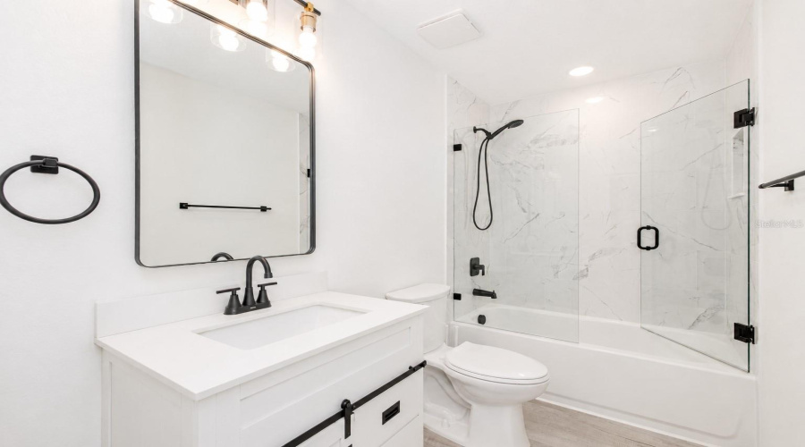 Guest Bathroom With Shower And Tub.