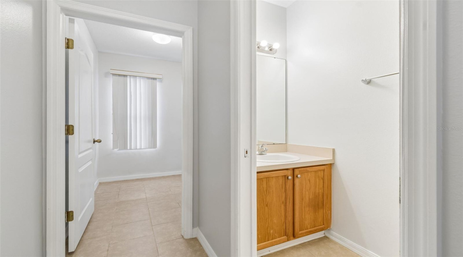 Hall To Powder Room For Guests And Laundry Room