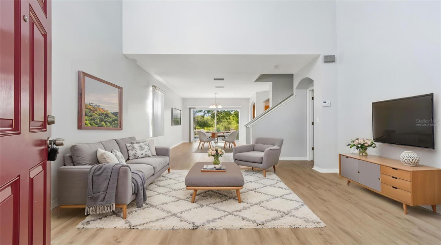 Virtually Staged. Living Area Into Daing Area.