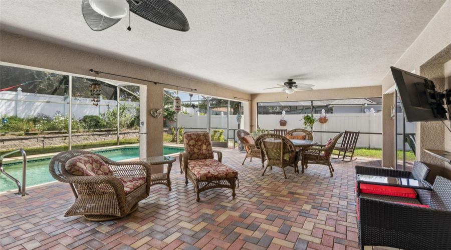 Oversized Paver Patio And Pool Area.