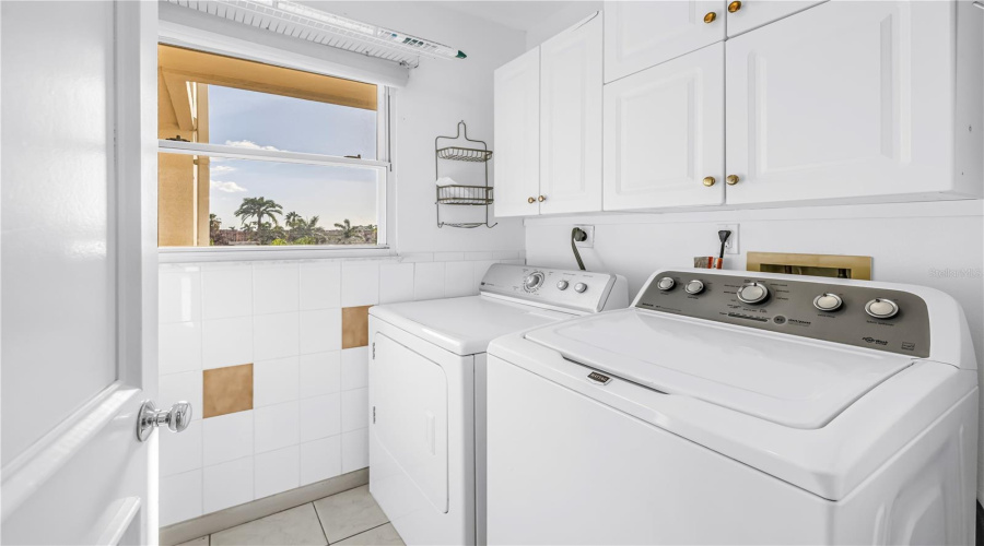 Laundry Room Located Behind Kitchen