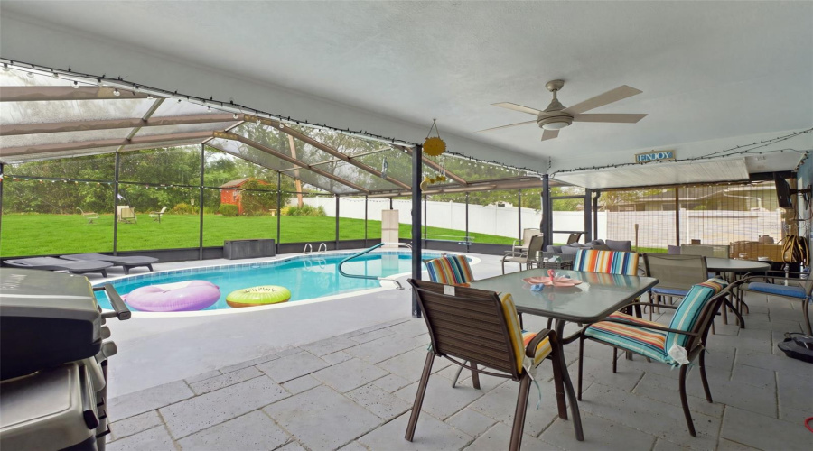 Covered Rear Porch For Entertaining.