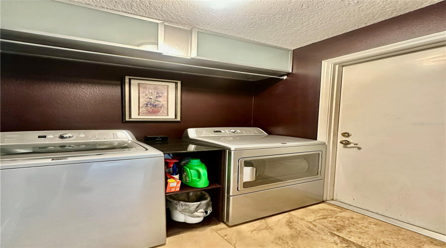 Laundry Room With Maytag Washer And Dryer