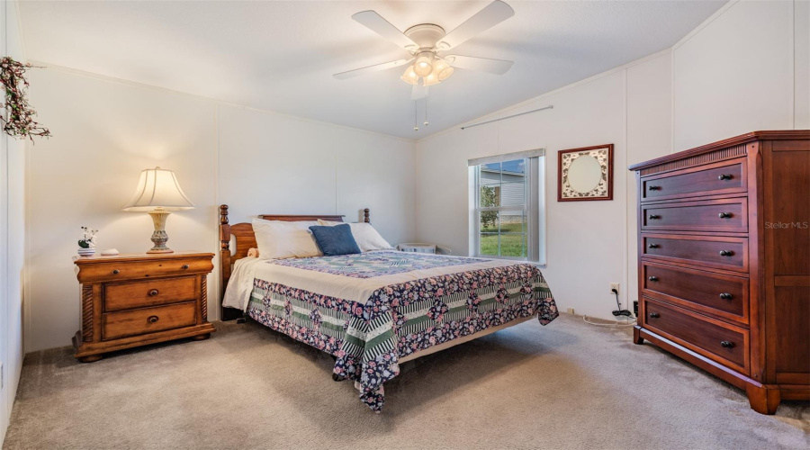Guest Bedroom Is Furnished With Walk In Closet