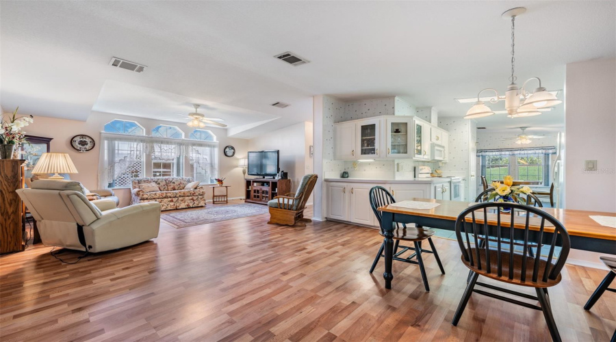 Wood Laminate Floors In This Open Concept Plan