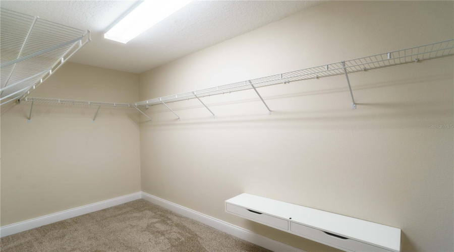 Walk In Closet In Primary Bedroom