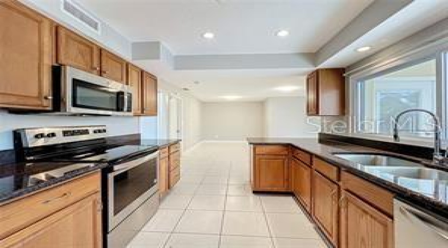 Clearwater, Florida 33759, 4 Bedroom Bedrooms, ,3 Bathroombathrooms,Residential,For Sale,Kapok Kove,0,Mfrtb8505002