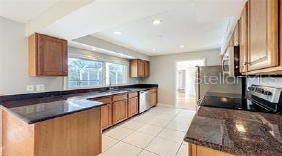 Clearwater, Florida 33759, 4 Bedroom Bedrooms, ,3 Bathroombathrooms,Residential,For Sale,Kapok Kove,0,Mfrtb8505002