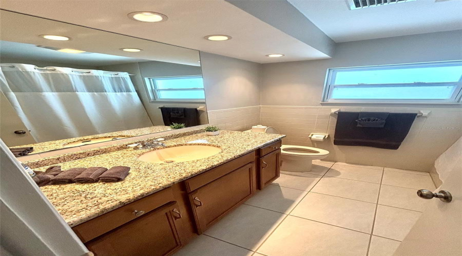 Clearwater, Florida 33759, 4 Bedroom Bedrooms, ,3 Bathroombathrooms,Residential,For Sale,Kapok Kove,0,Mfrtb8505002