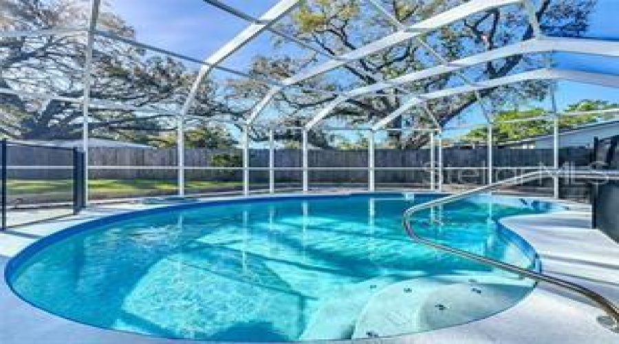 Clearwater, Florida 33759, 4 Bedroom Bedrooms, ,3 Bathroombathrooms,Residential,For Sale,Kapok Kove,0,Mfrtb8505002