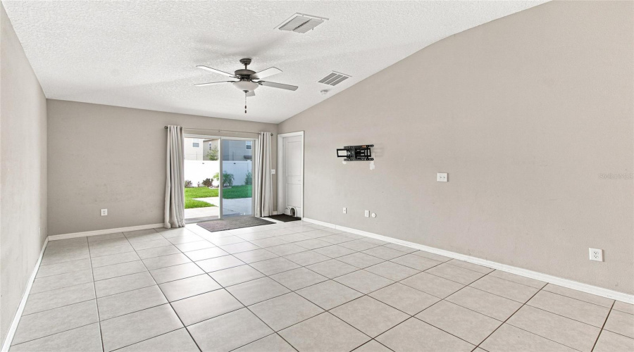 Living Area With Slider To Backyard