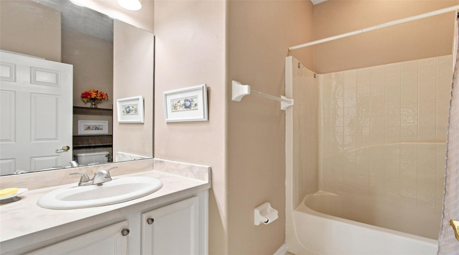 Hall Bathroom With Fiberglass Tub