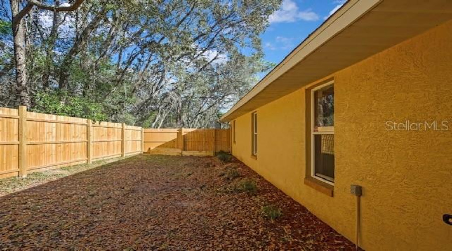 Fenced Area Side Of Home