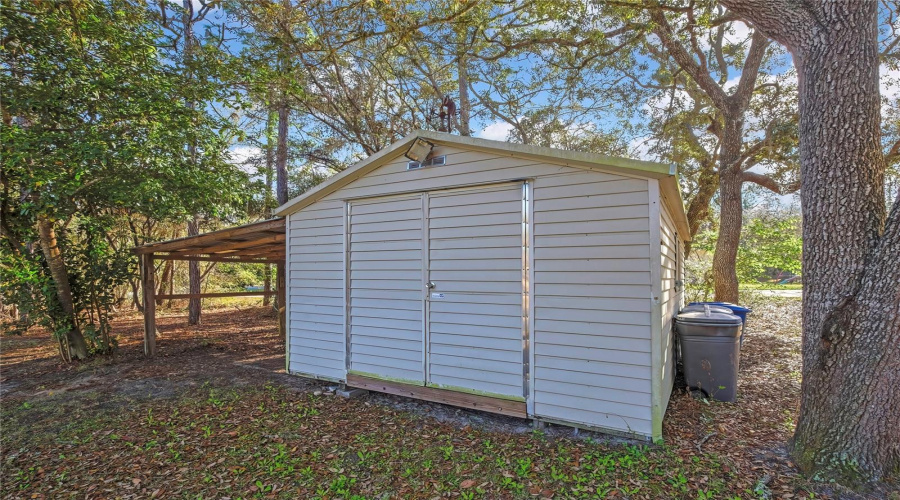 Storage Shed With Carport And Electric