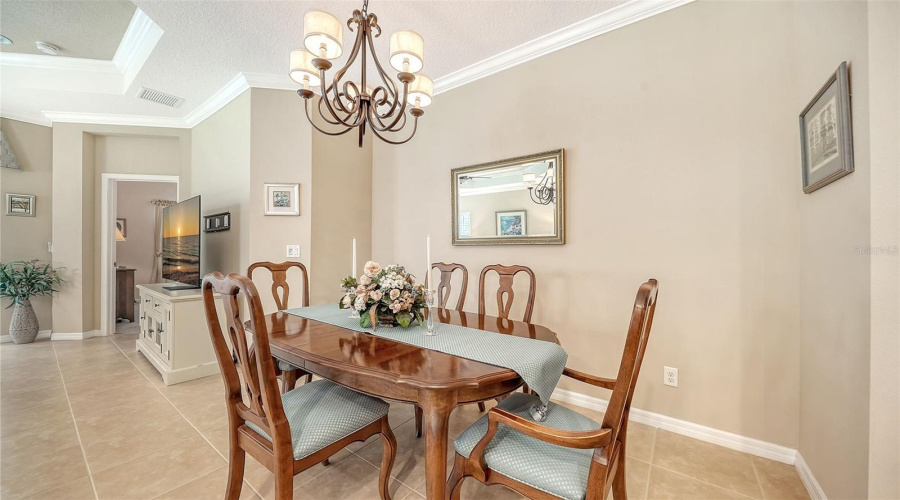 Dining Area Perfectly Positioned Adjacent To The Kitchen And Great Room