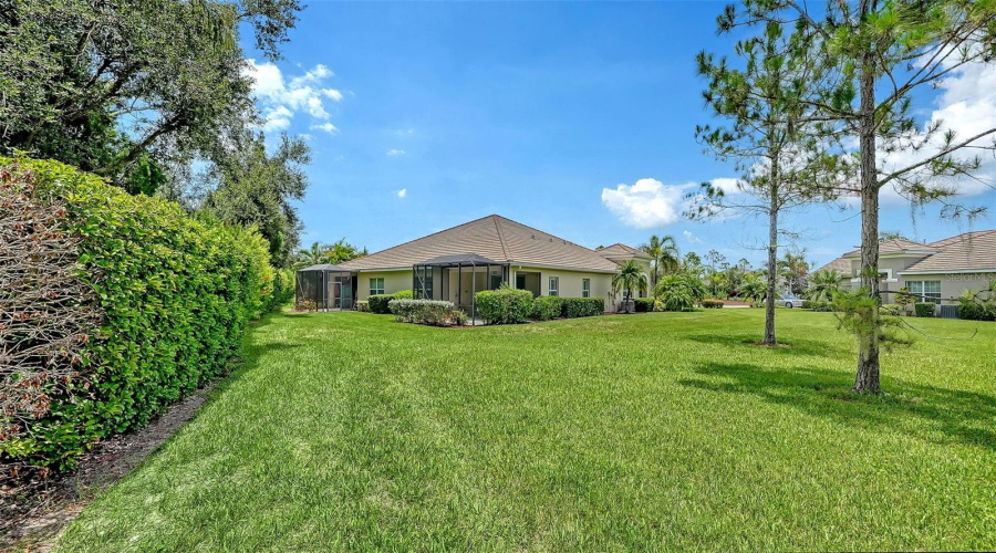 The Oversized Homesite Provides A Rare Sense Of Privacy, Framed By Mature Landscaping That Creates A Peaceful Backdrop