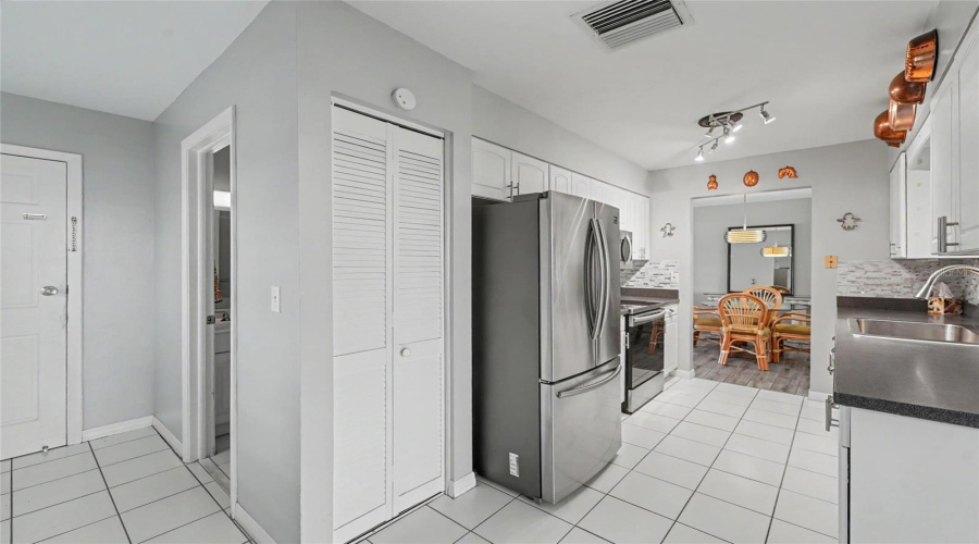 Kitchen, Pantry, And Garage Entry