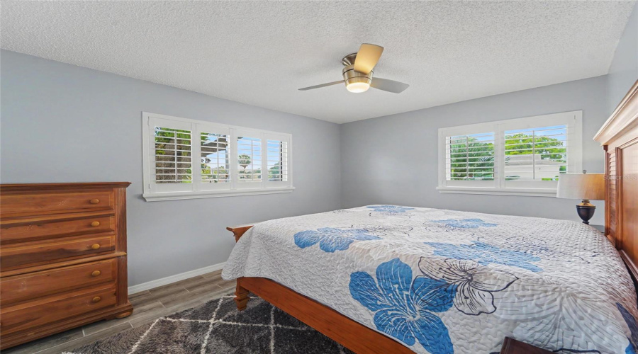 Primary Bedroom &Amp; Windows With Plantation Shutters